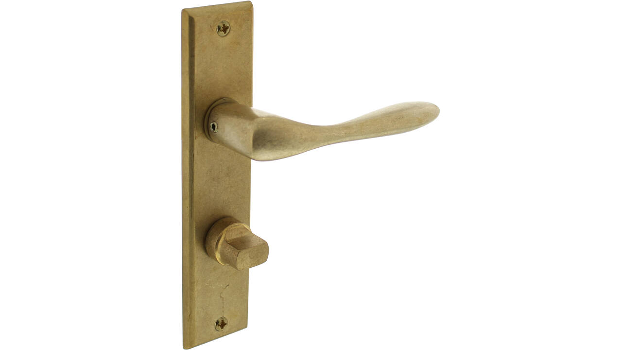 Deurkruk Banaan met schild rechthoekig 181x41mm wc 63/8mm messing getrommeld