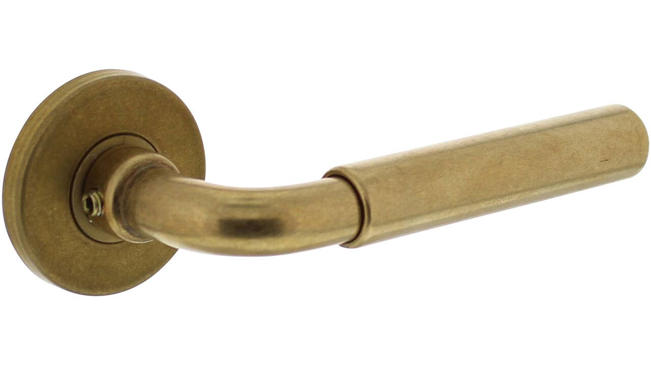 Deurkruk Palma met rozet verdekt ø49x7mm messing getrommeld