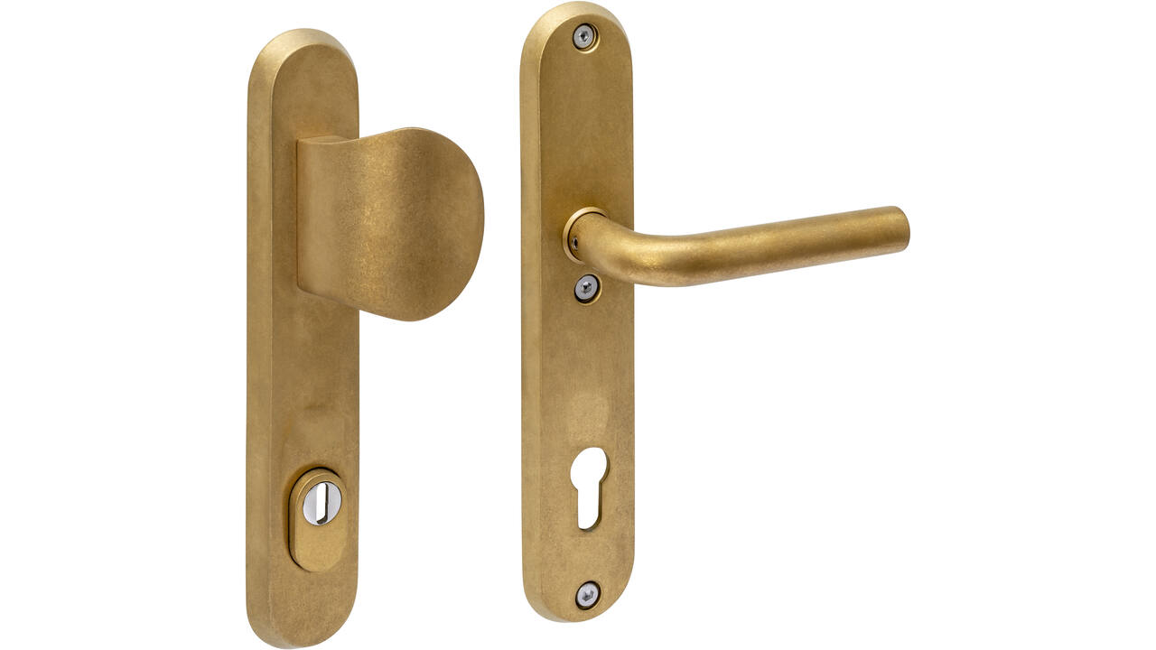 SKG3 veiligheidsbeslag ovaal 250x50mm greep/kruk Luzern met veerconstructie profielcilindergat 92mm met kerntrekbeveiliging PVD messing getrommeld