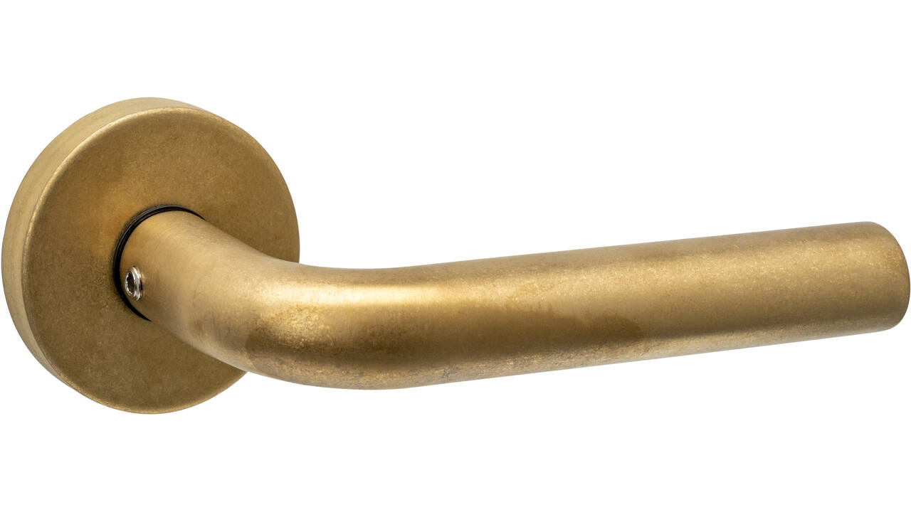 Deurkruk Luzern met rozet massief verdekt ø53x10mm met nokken PVD messing getrommeld