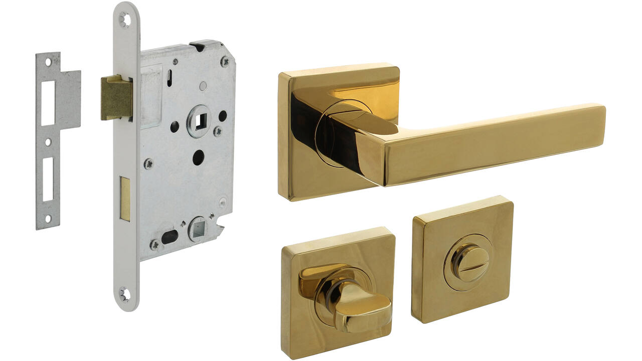 Set toiletslot 63/8mm wit met deurkruk Hera op rozet 55x55mm en WC-sluiting PVD messingkleur