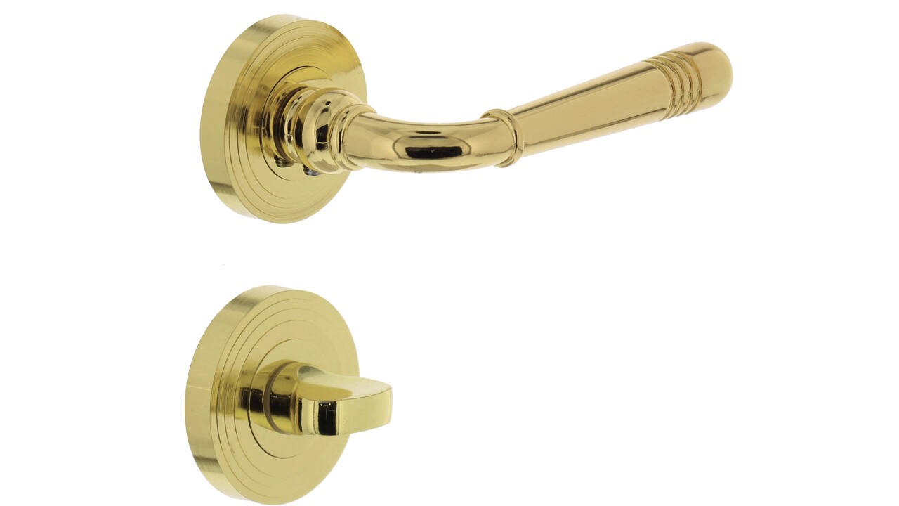 Deurkruk Helena op rozet verdekt met rillen ø55x10mm met nokken en WC-sluiting met stift 8x8mm PVD messingkleur