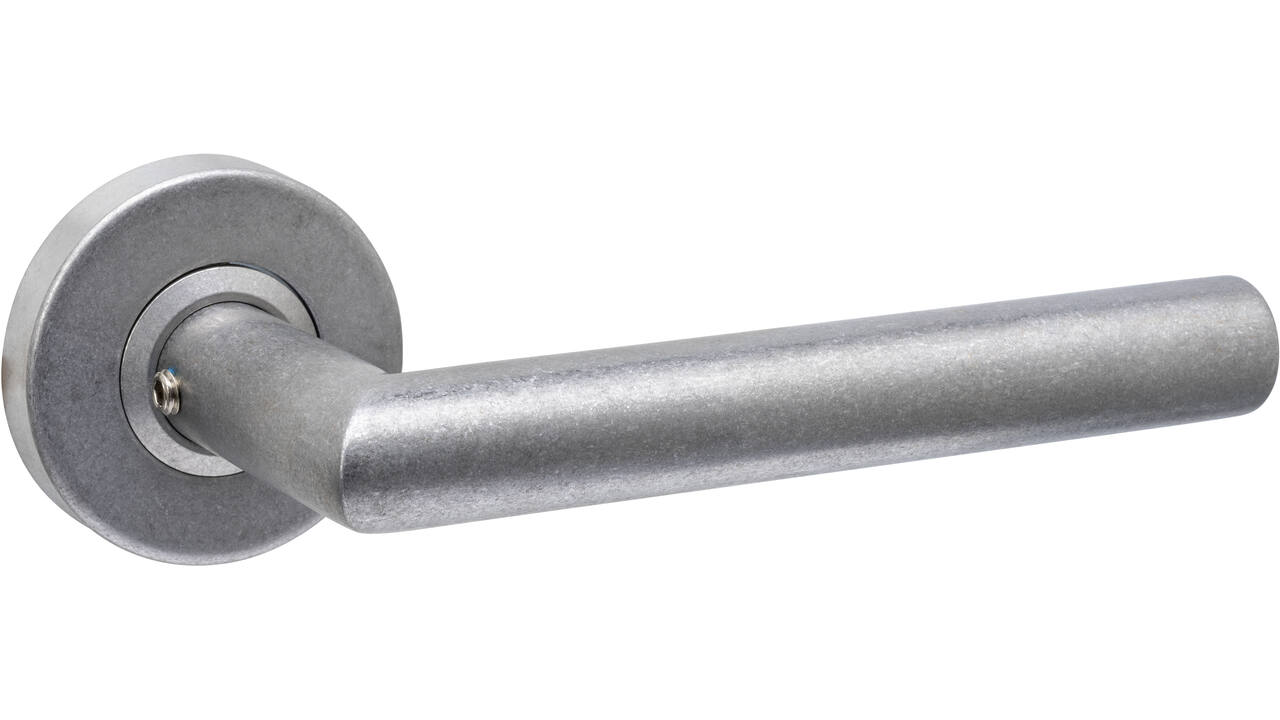 Deurkruk Jura op rozet verdekt ø53x10mm rvs getrommeld