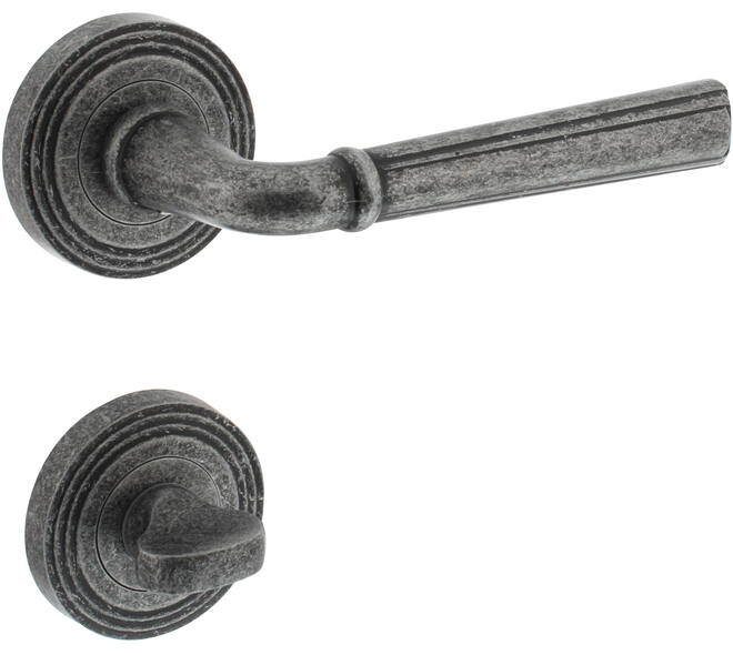 Deurkruk Bellevue op rozet verdekt met rillen ø55x10mm met nokken en WC-sluiting met stift 8x8mm oud grijs