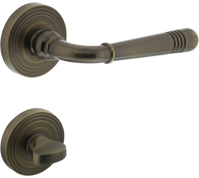 Deurkruk Helena op rozet verdekt met rillen ø55x10mm met nokken en WC-sluiting met stift 8x8mm gebruineerd