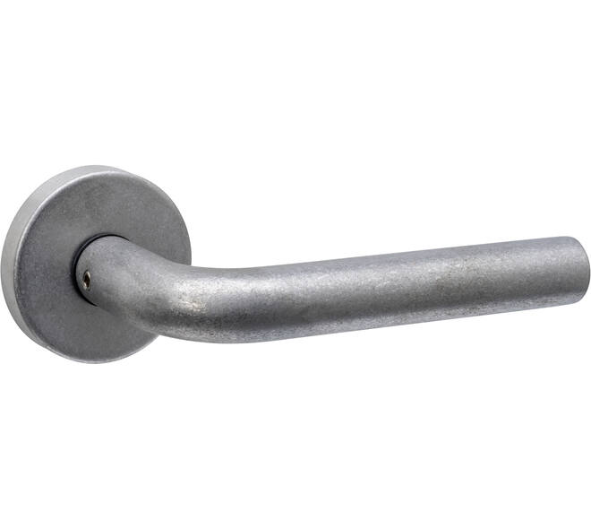 Deurkruk Luzern met rozet massief verdekt ø53x10mm met nokken rvs getrommeld