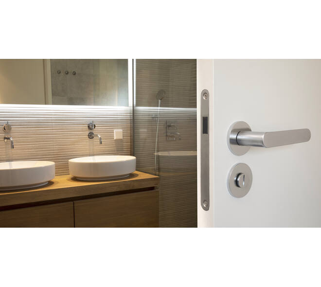 Olivari deurkruk Icona + ronde geveerde rozet 51x5mm met nokken en doorgaande bevestiging Chroom mat