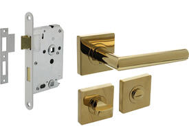Set toiletslot 63/8mm wit met deurkruk Bastian op rozet 55x55mm en WC-sluiting PVD messingkleur